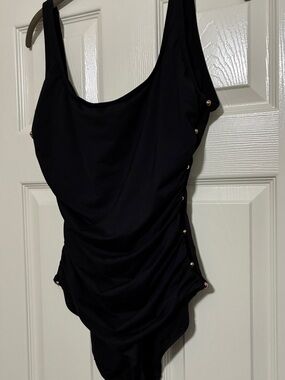 CARMEN MARC VALVO BLACK ONE PIECE SWIMSUIT SIZE 14. scoop neck. Cut out sides.